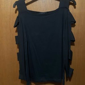Adorable, Sexy and Classy black top with cut out sleeves. Smoke and pet freehome